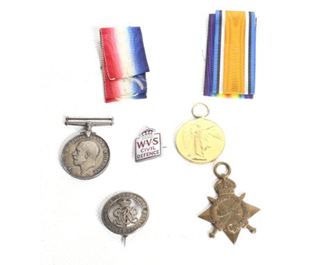 A set of three WWI medals and three badges. Comprising the 1915-15 Star, (70385 SPP:R Abbott. R.E.), British War Medal (70385