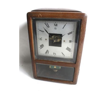 A French Art Deco Bulle battery operated mantel clock. In an oak case, two section glass front, silvered square dial with Rom