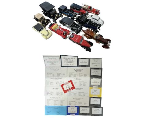 A collection of various Franklin mint model cards, with accompanying certificates