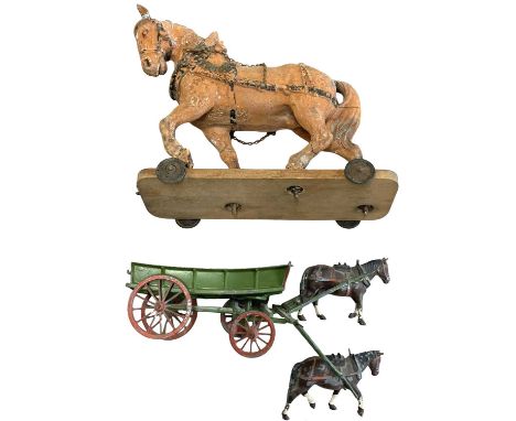 A composite model horse on wooden wheeled base (a/f), together with a die-cast pony trap with 2 Britains horses