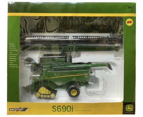 A boxed Britains model combine harvester, a John Deere S690i
