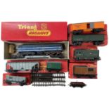 A collection of various Triang 00 gauge rolling stock.