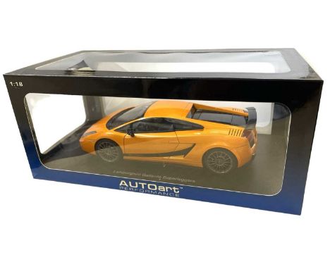 A boxed AutoArt 1:18 scale model Lamborghini Gallardo Superleggera, in bright orange