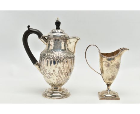 A LATE VICTORIAN SILVER HOT WATER JUG AND A LATE VICTORIAN GEORGIAN STYLE HELMET SHAPED CREAM JUG, the hot water jug with ebo