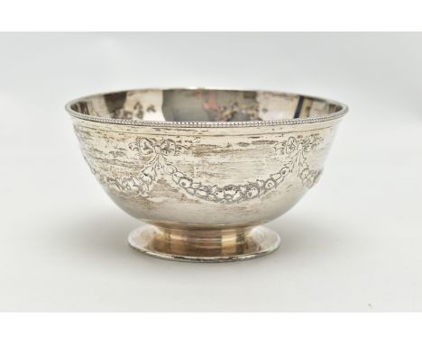 A VICTORIAN SILVER PEDESTAL BOWL, the beaded rim above repousse decorated ribbons and swags, vacant oval cartouche, the base 