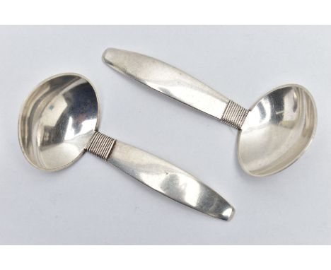 A PAIR OF DANISH STERLING SILVER CADDY SPOONS BY F. HINGELBERG, bears import marks for R C P Ltd, London 1947, stamped '925 S