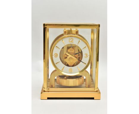 A JAEGER-LE COULTRE 'ATMOS' MANTEL CLOCK, serial number 560516, in a brass and five panel glazed rectangular case, recessed w