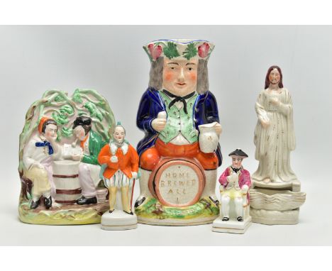 A VICTORIAN STAFFORDSHIRE POTTERY TOBY JUG AND FOUR VICTORIAN STAFFORDSHIRE FIGURES, comprising a jug modelled as a toby seat