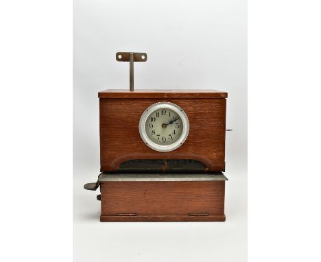 A 20TH CENTURY ENGLISH CLOCK SYSTEMS LTD OAK AND LAMINATE CASED TIME RECORDING CLOCK, the rectangular case with hinged lid be