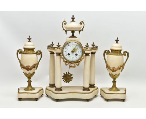 A LATE 19TH CENTURY FRENCH WHITE MARBLE AND GILT METAL CLOCK GARNITURE, the clock with urn surmount above a circular white en