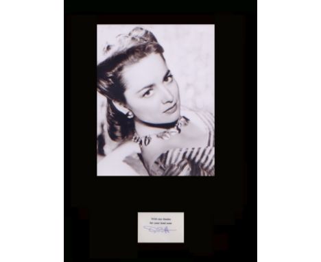 Olivia DeHavilland. White card with initials “O de H” with vintage portrait. Professionally mounted in black to 16”x12”. Exce