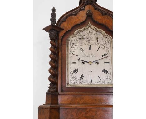A Victorian walnut bracket clock, c.1870, with an eight-day movement striking on a gong, the engraved silvered dial set with 