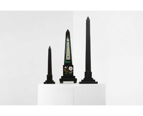 Three Ashford black marble obelisks,  comprising two modelled after Cleopatra's Needle at Alexandria, the third fitted with a