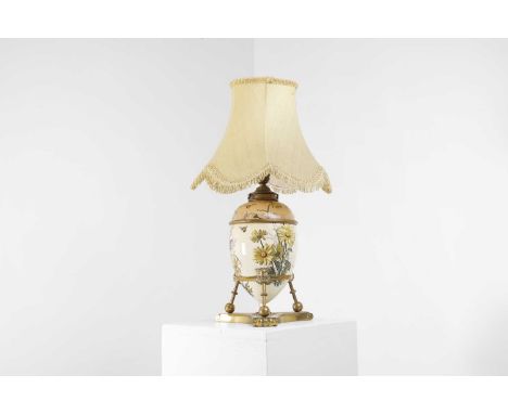 A Victorian porcelain oil lamp, 19th century, probably by Doulton Pottery, the mounts marked 'HINKS &amp; SONS PATENT', over 