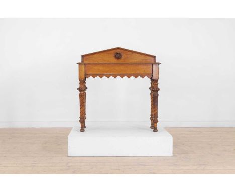 A Victorian blonde oak side table, second half of the 19th century, of architectural form, with a pointed superstructure, rai