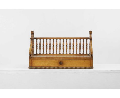 A Regency burr maple desk stand, early/mid-19th century, of rectangular form with a spindle-turned gallery back and carrying 