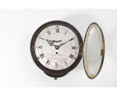 A George III circular mahogany wall clock, the 8½-inch silvered dial inscribed ‘Ralph Glover, Hyde Park Corner' and with a vi