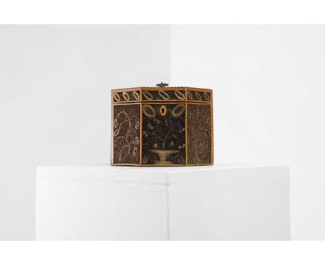A paper-scroll tea caddy, 19th century and later, of hexagonal form with banded edges, enclosing paper scrolls forming a flow