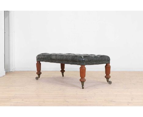 A large Victorian-style oak and leather stool, of recent manufacture, but with incorporated earlier elements, 153cm wide84cm 