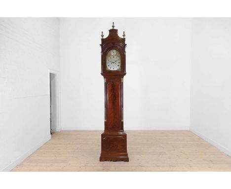 A George III mahogany longcase clock, late 18th century and later, the eleven-inch dial with silvered chapter ring inscribed 