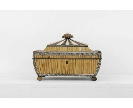 A Vizagapatam quillwork, ivory, horn and bone workbox,  19th century, Anglo-Indian, of shaped sarcophagus form, the hinged co