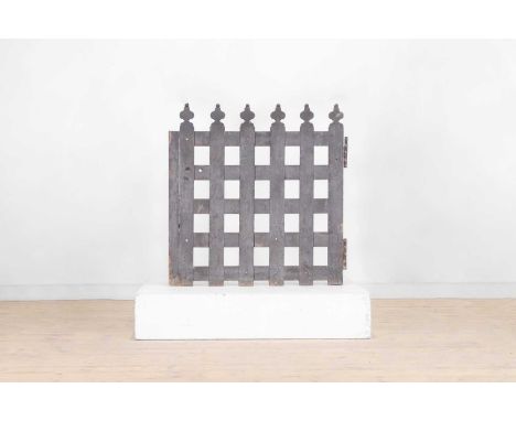 A painted oak dog gate, later 18th/early 19th century, with six baluster finials, 86cm wide3.5cm deep90cm high