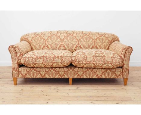 A three-seater sofa, of recent manufacture, designed by Guy Goodfellow for Colefax &amp; Fowler, in the Howard &amp; Sons 'Au