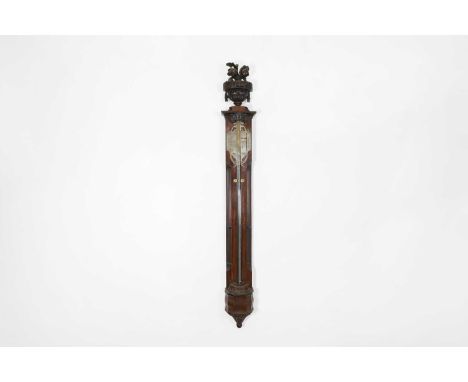 A George III mahogany stick barometer, late 18th century, in the Dutch style, the engraved and pierced double register dated 