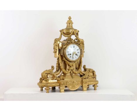 An Empire-style ormolu mantel clock, late 19th century, French, by Le Roy &amp; Fils, the enamel dial inscribed 'Le Roy &amp;