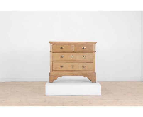 A pale oak chest of drawers, 20th century, fitted with two short and two long drawers on bracket feet, 99cm wide48cm deep84cm