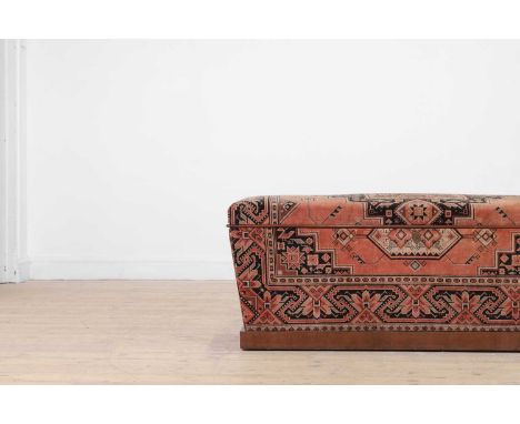 An upholstered ottoman, 20th century, with Anatolian-style fabric,132cm wide55cm deep53cm highCondition ReportLight staining 