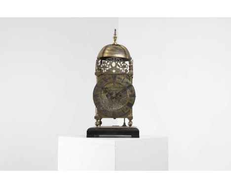 A brass lantern clock, 19th century in the 17th-century style, English, the dial with foliate engraving and inscribed ‘John F