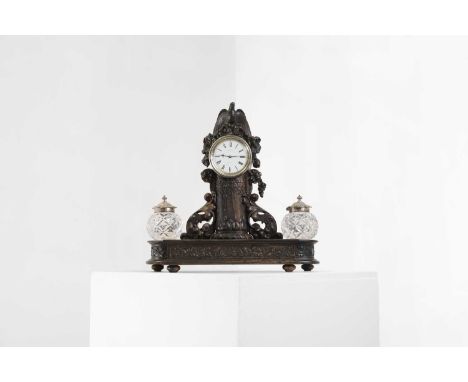 A Victorian presentation coromandel desk stand, by William Gibbs Rogers, the enamelled dial inscribed 'James Hux, 20 Down Str