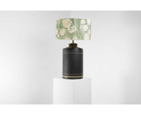 A toleware tea canister lamp, of recent manufacture, with a floral shade with a green ground, 39cm diameter64cm high includin