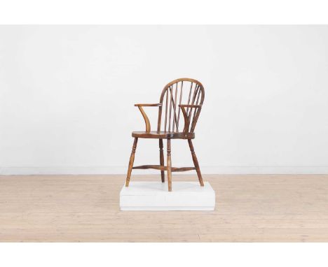 A fruitwood and elm Windsor chair,  early 19th century, Thames Valley, with a low hoop back and single ring-turned supports, 