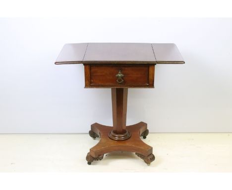 William IV mahogany sofa table, with drop leaves and single drawer above tapering octagonal column on quad base with carved s