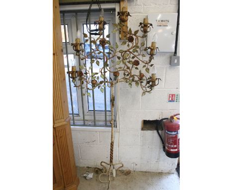 Early 20th century Continental standard lamp, wrought iron with scrolling flowering branches above tripod base with scroll fe