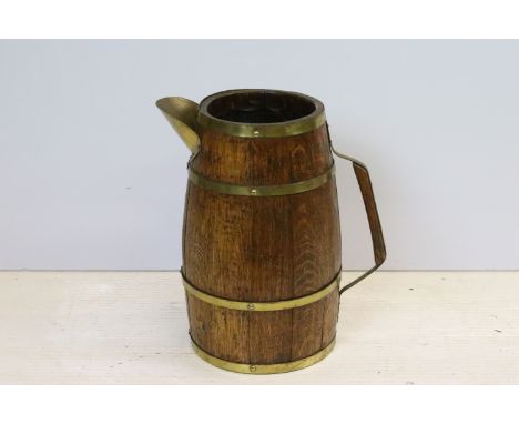 Early 20th century coopered oak and brass bound stick / umbrella stand in the form of a large jug, 45cm high