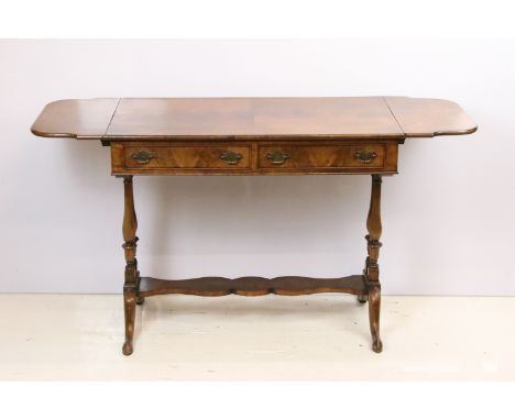 20th century mahogany sofa table with two drop leaves above two drawers on turned supports, 72.5cm high x 138cm wide (extende