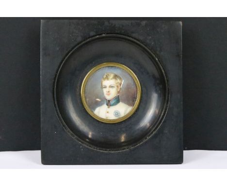 20th century circular portrait miniature, depicting a military gentleman, watercolour on ivorine, French passage verso and in