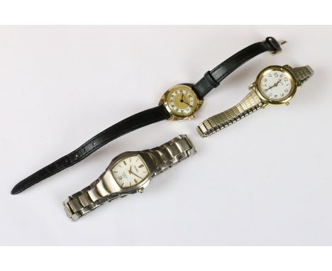 A small collection of three ladies wristwatches to include a Seiko Titanium example. 