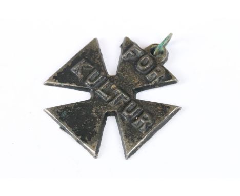 A British World War One propaganda medal 'For Kultur' in the form of an iron cross. 