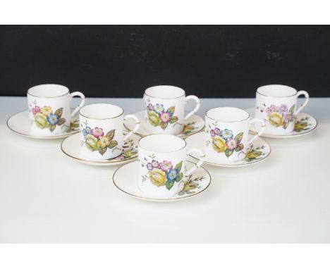 Royal Worcester floral bouquet and gilt edged set of six demitasse coffee cups and saucers