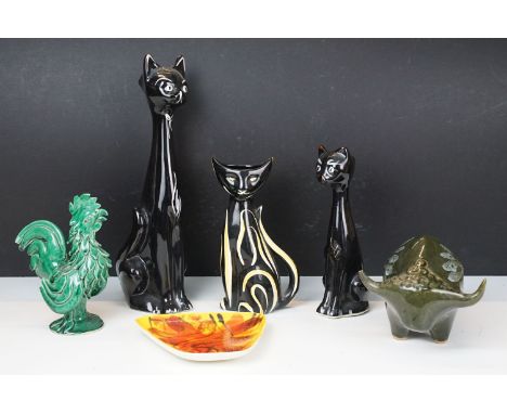 Group of mid 20th century retro ceramics to include Poole decorative plate, Lotus pottery bull, long neck cat vases, rooster 