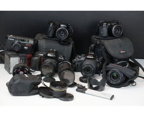 Collection of cameras and related equipment to include Nikon F50, Olympus E-420, a zuiko digital 14-42mm lens, Fujifilm Finep