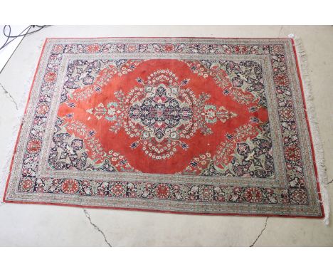 20th century Iranian silk red ground carpet with central medallion within borders, 209 x 140cm