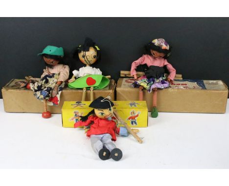 Three boxed Pelham Puppets including Chinese boy, Gypsy and simple dancing puppet together with another Pelham type puppet