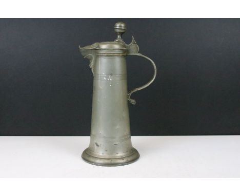 Early 18th century lidded pewter flagon pitcher, etched H.G.BB 1738 to front, H 30cm