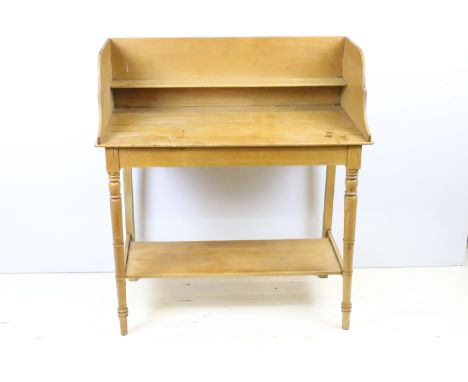 Early 20th century pine washstand, the galleried back with shelf, on turned legs with undertier, 101.5cm x 90cm wide x 47cm d