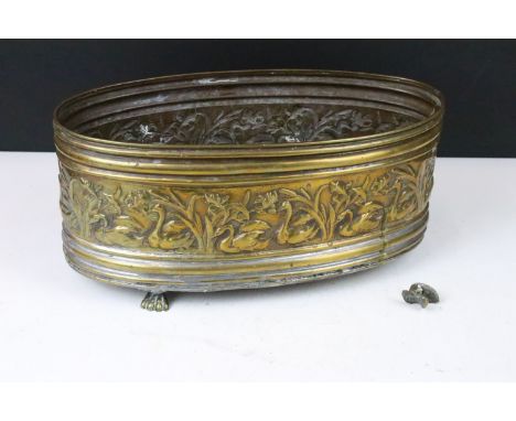 Brass oval planter with relief swan surround decoration, raised on three brass paw feet (one paw present but broken) H 16.5cm